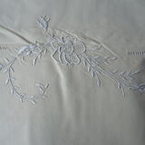 Old linen sheets embroidered with flowers