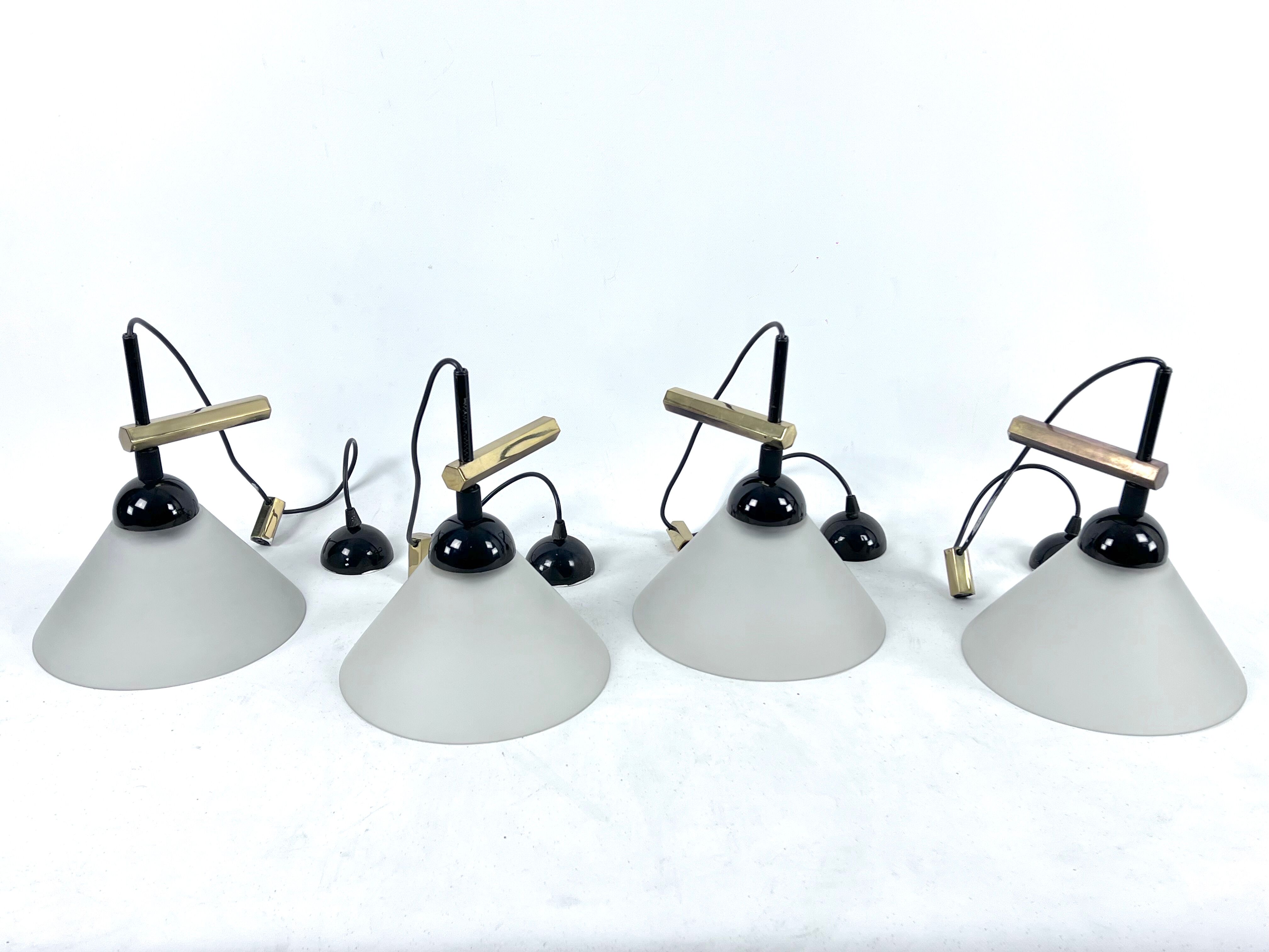 Rare Set of four Italian Modern brass and Murano glass wall lamps by Quattrifolio. 1970s