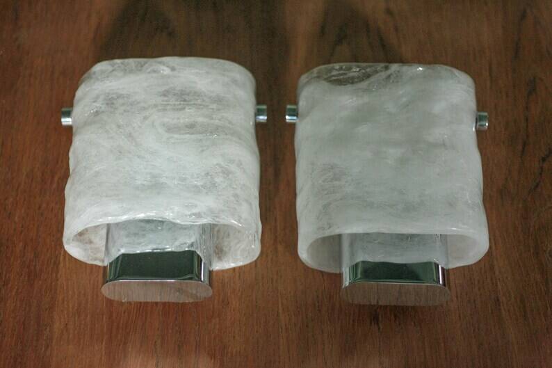 Pair of chrome wall sconces with Murano glass, wall light, art of glass, interior decoration.