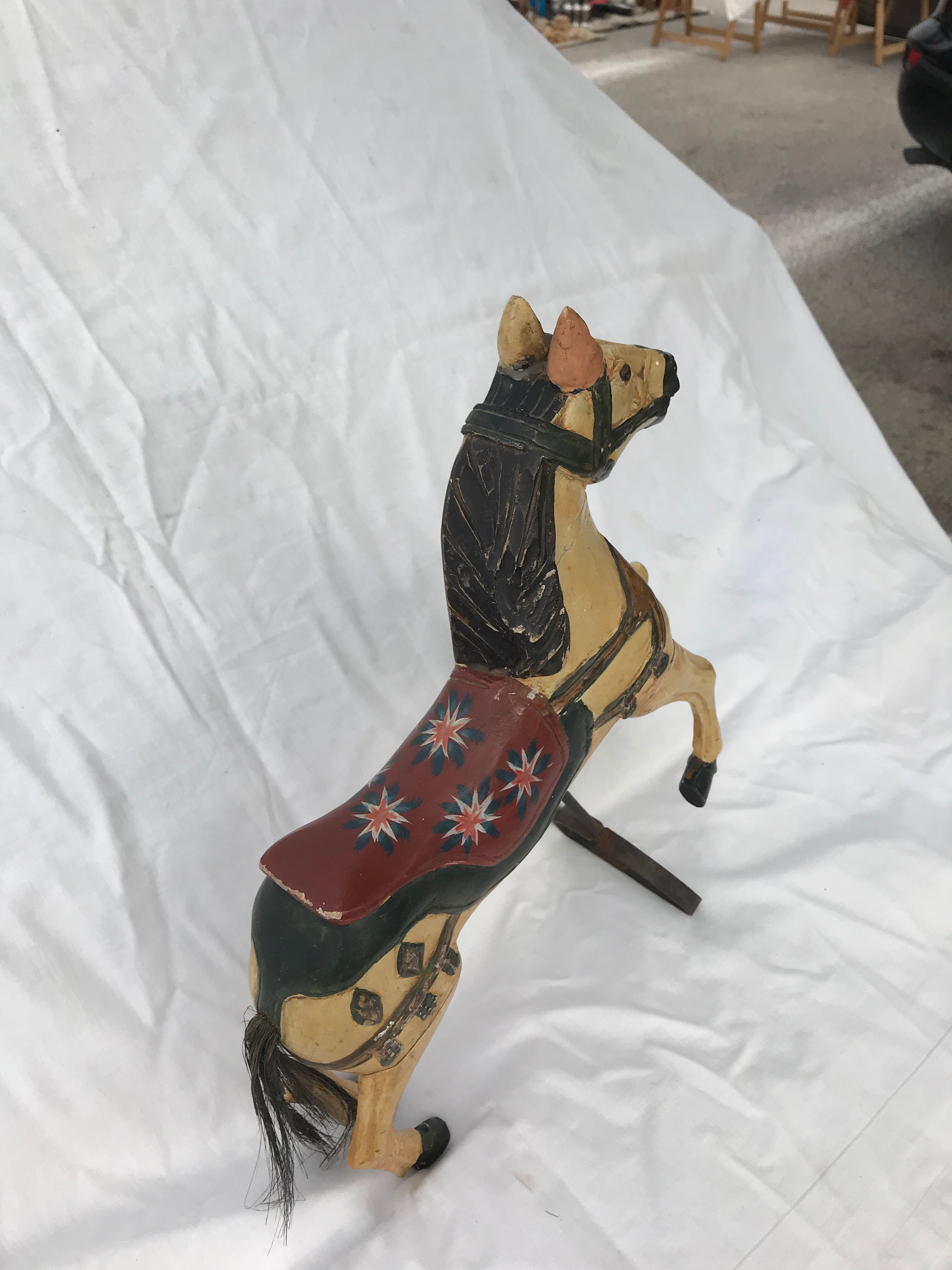 Wooden horse with period ironwork support