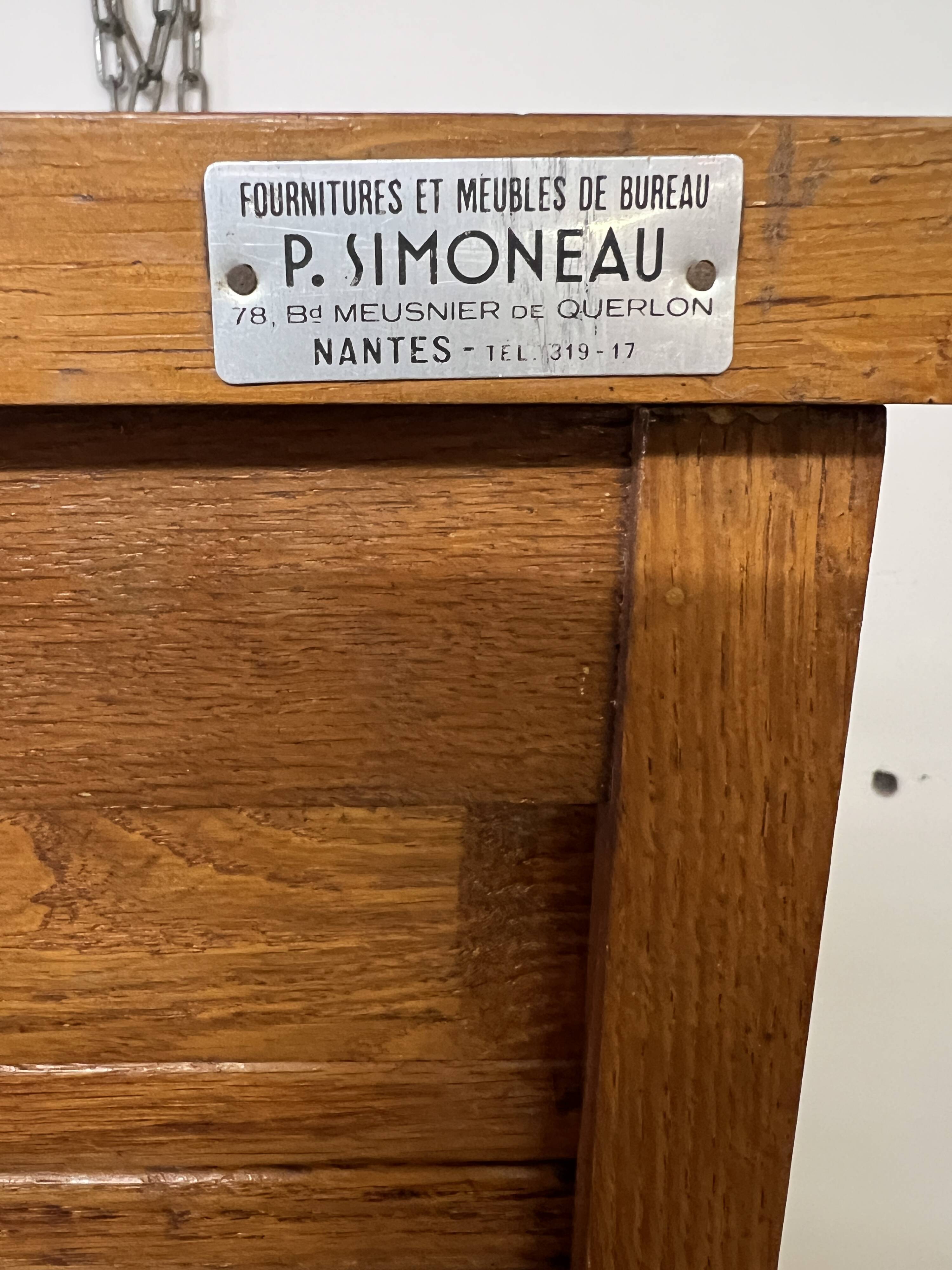 Old filing cabinet with triple curtains
