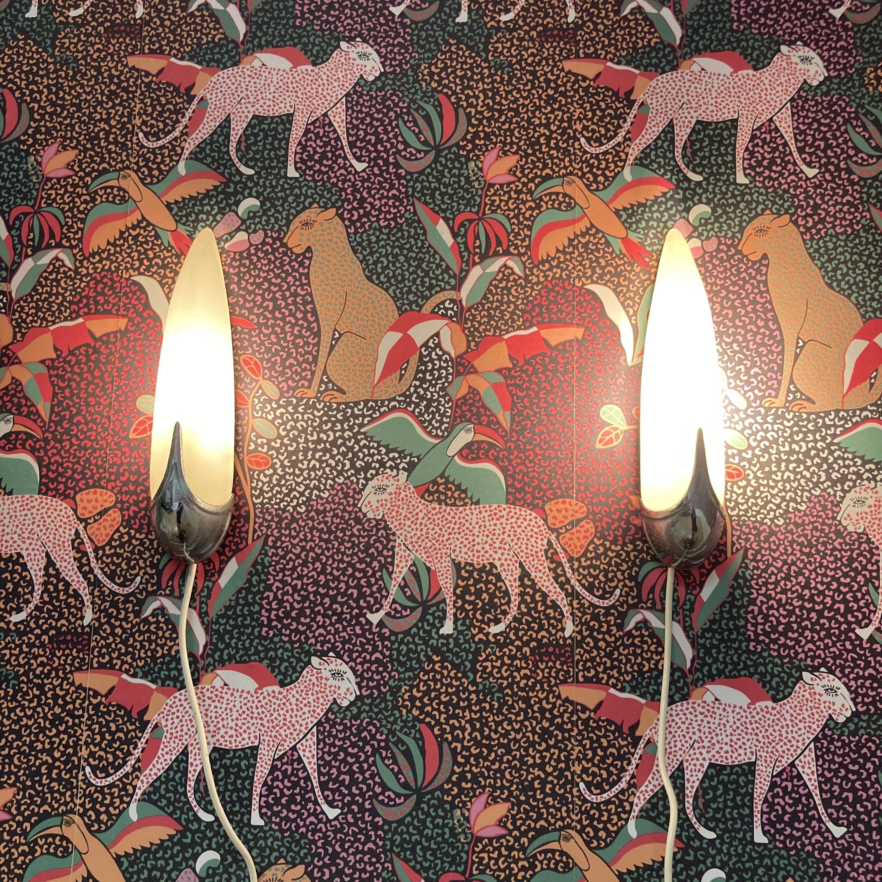 Pair of 1950s designer glass wall lights.