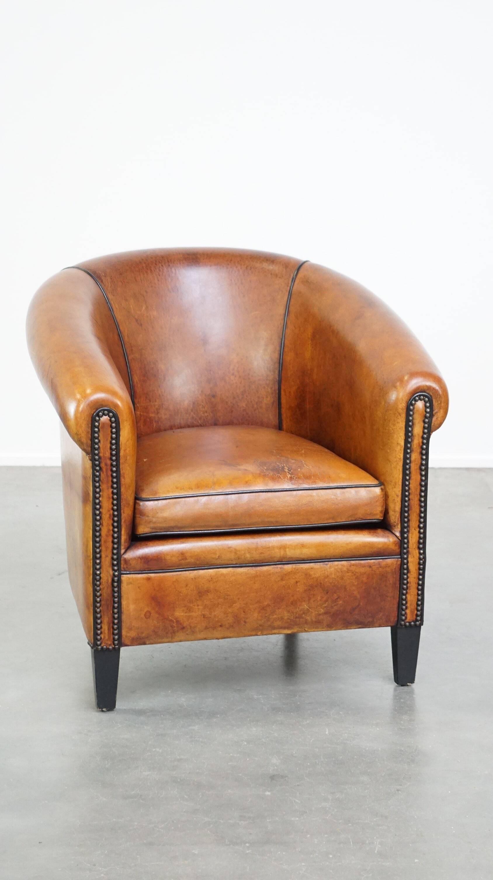 Fauteuil club vintage en cuir de mouton