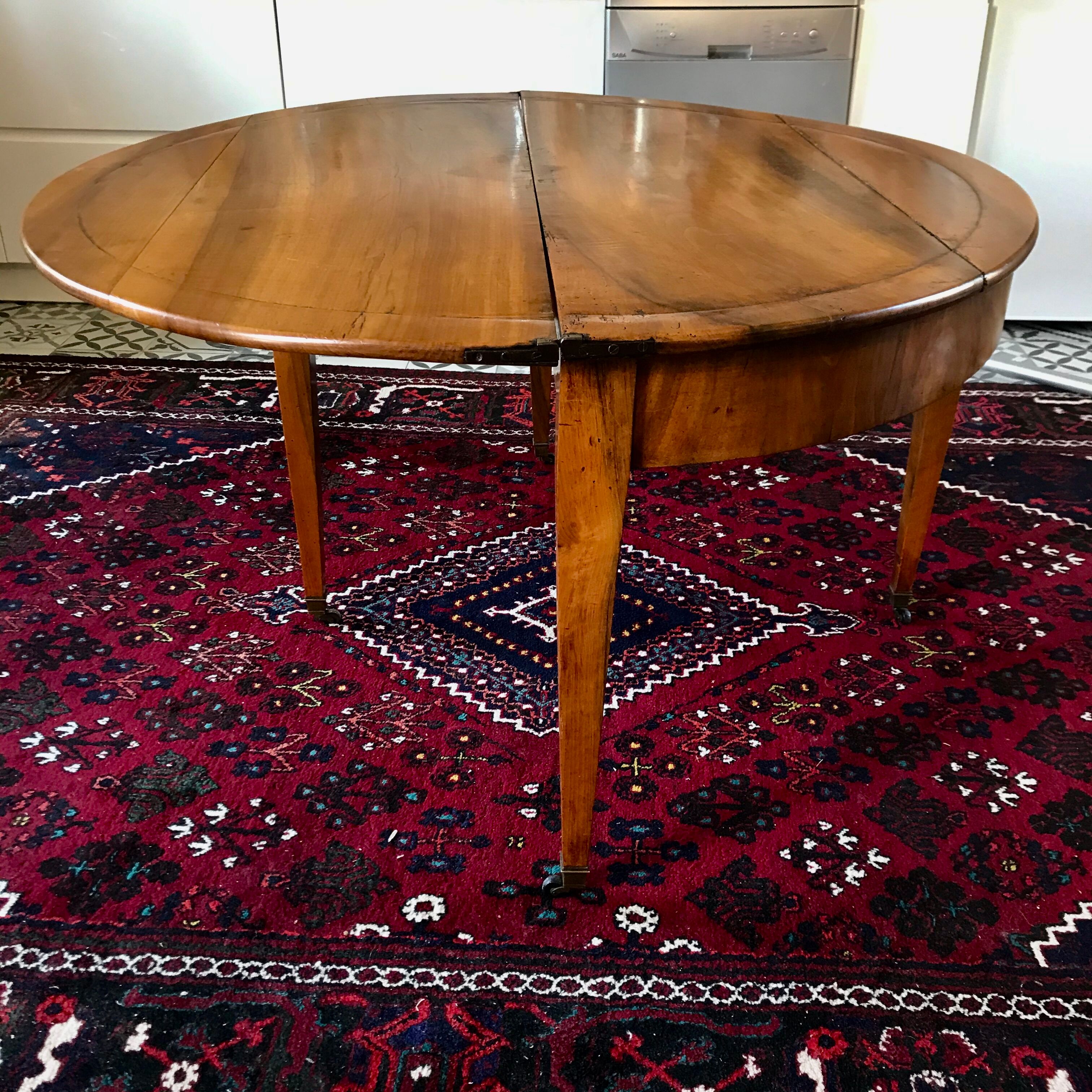 Antique half moon table in walnut