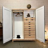 Wardrobe with two wardrobe compartments and drawers