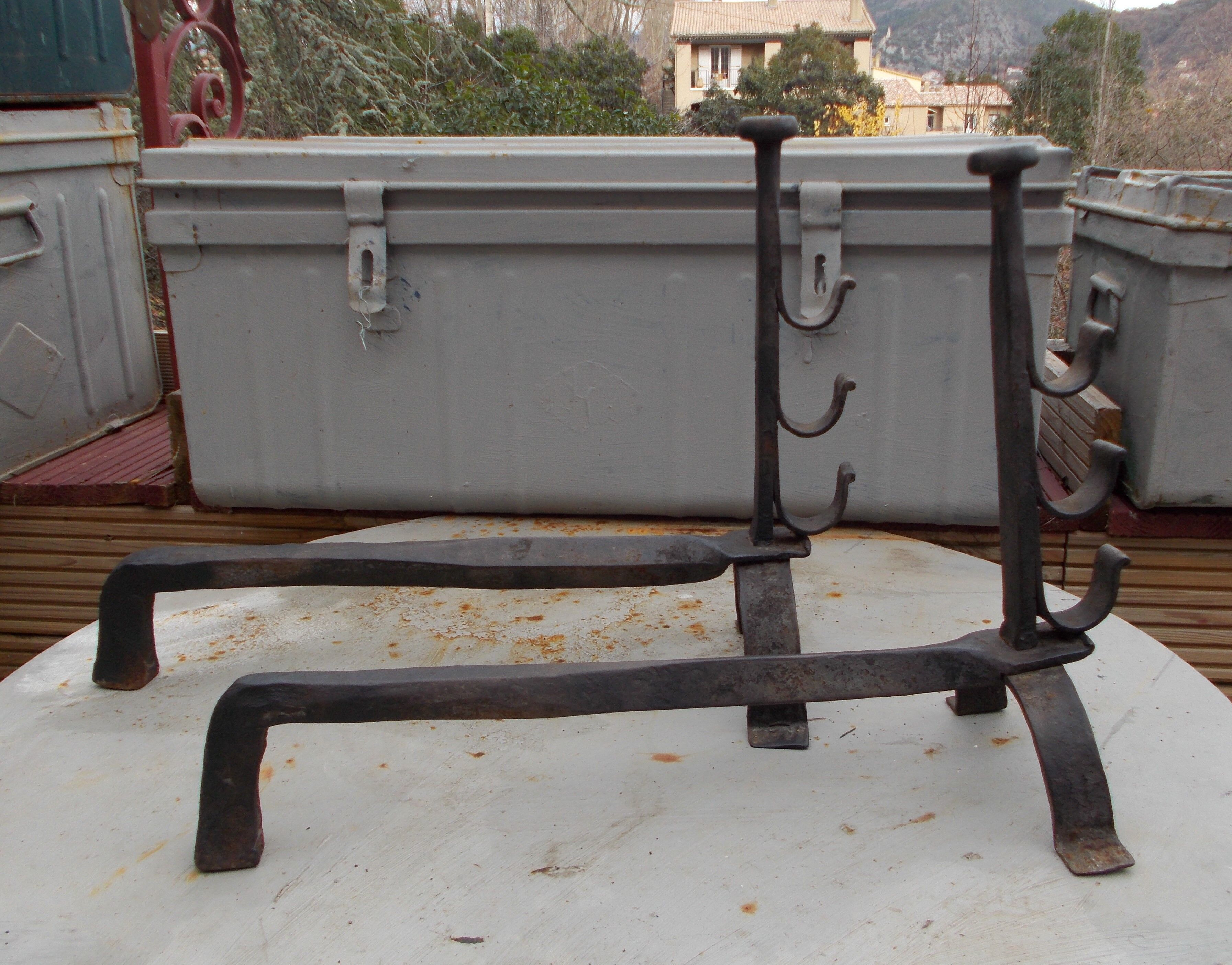 Old pair of wrought iron pegs