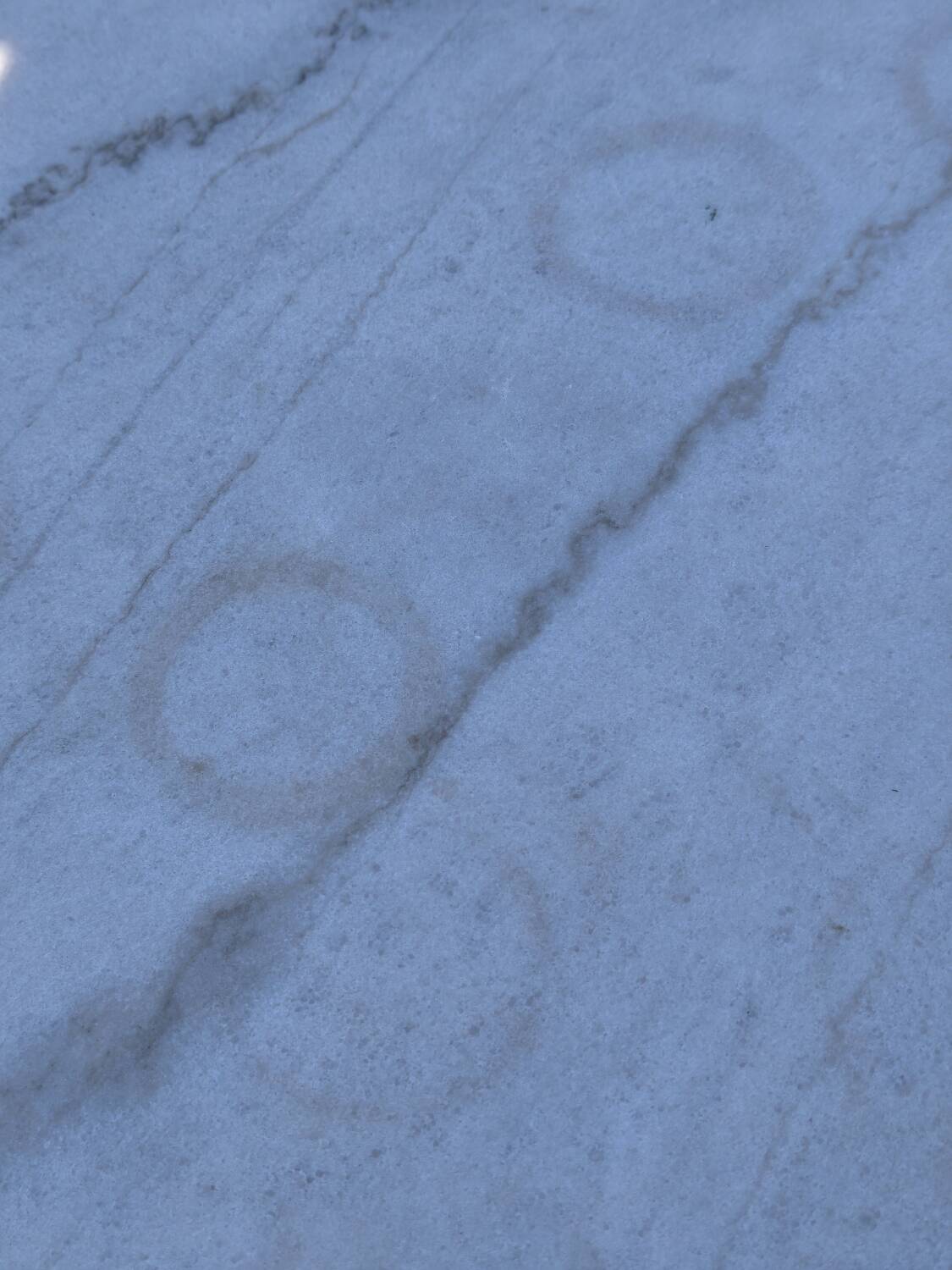 Marble bistro table with cast iron legs in Parisian café style