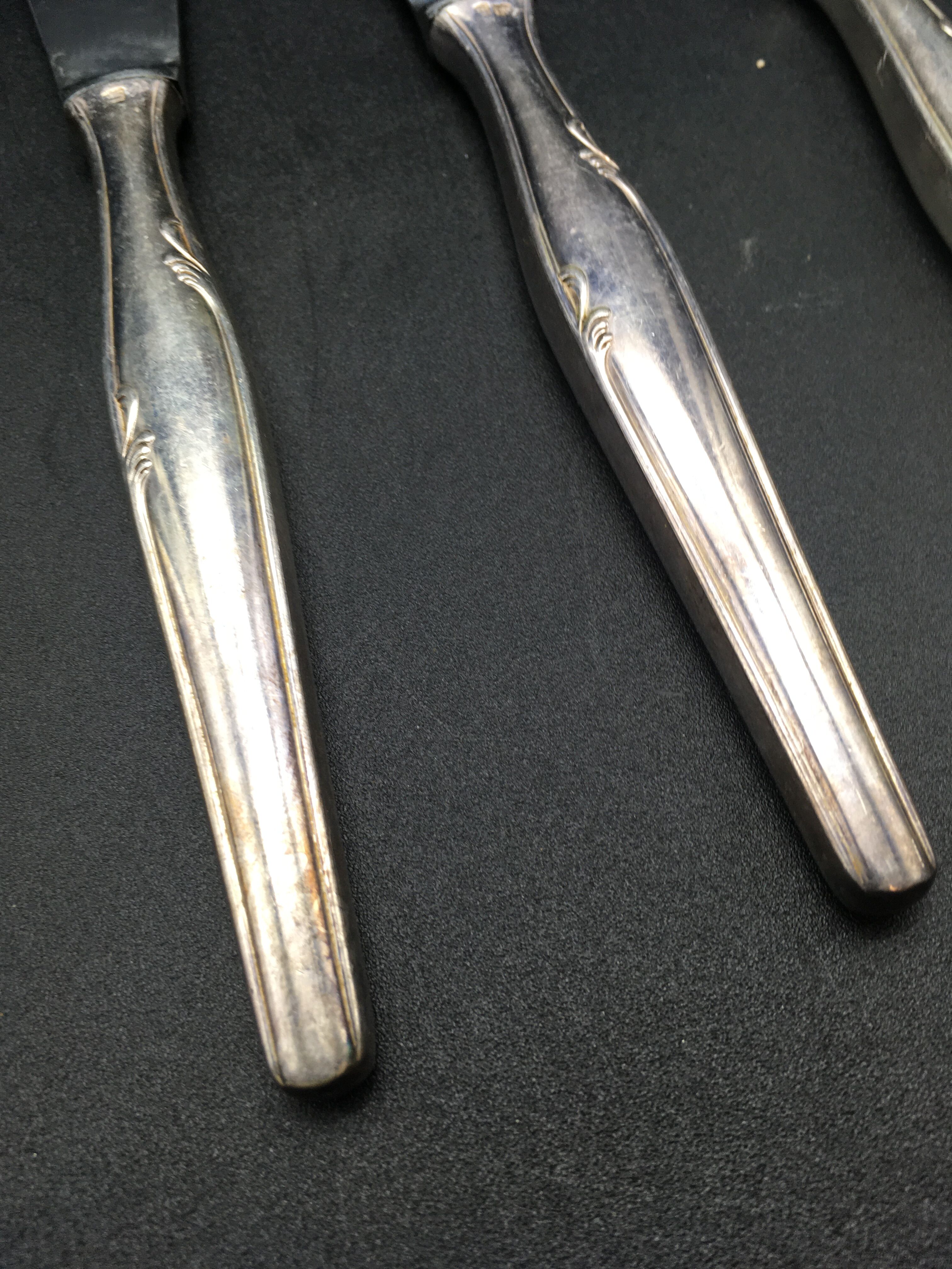 12 silver metal knives