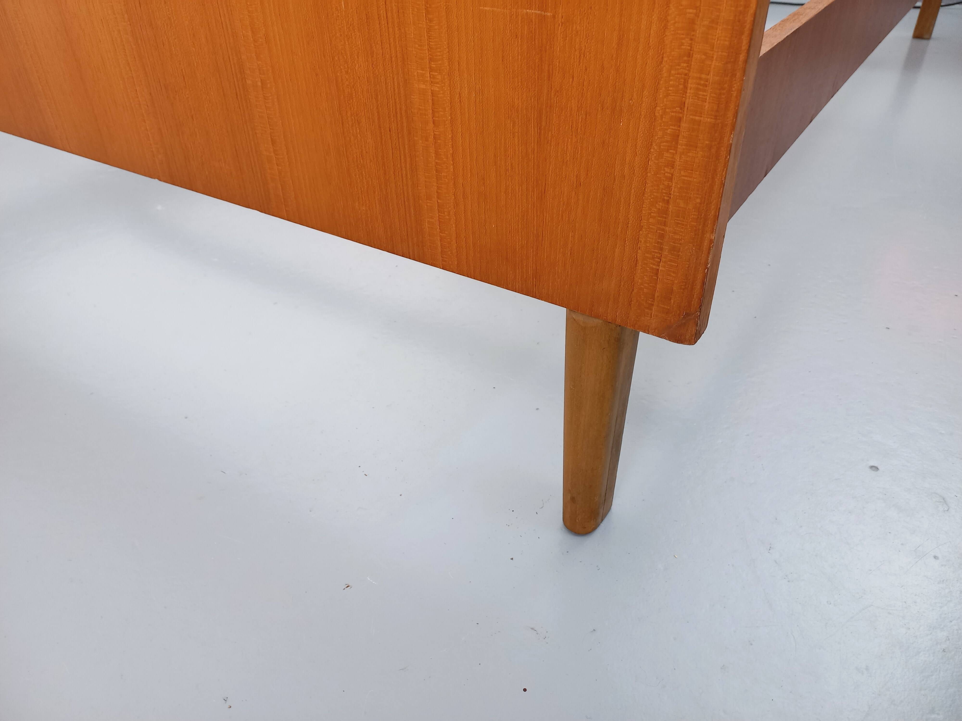 Vintage Scandinavian style double bed in teak from the 60s with integrated bedside lights