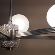 Six-light chrome metal chandelier and opaque glass globes / vintage 60s and 70s
