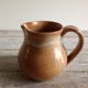 Milk pot in sizzles
