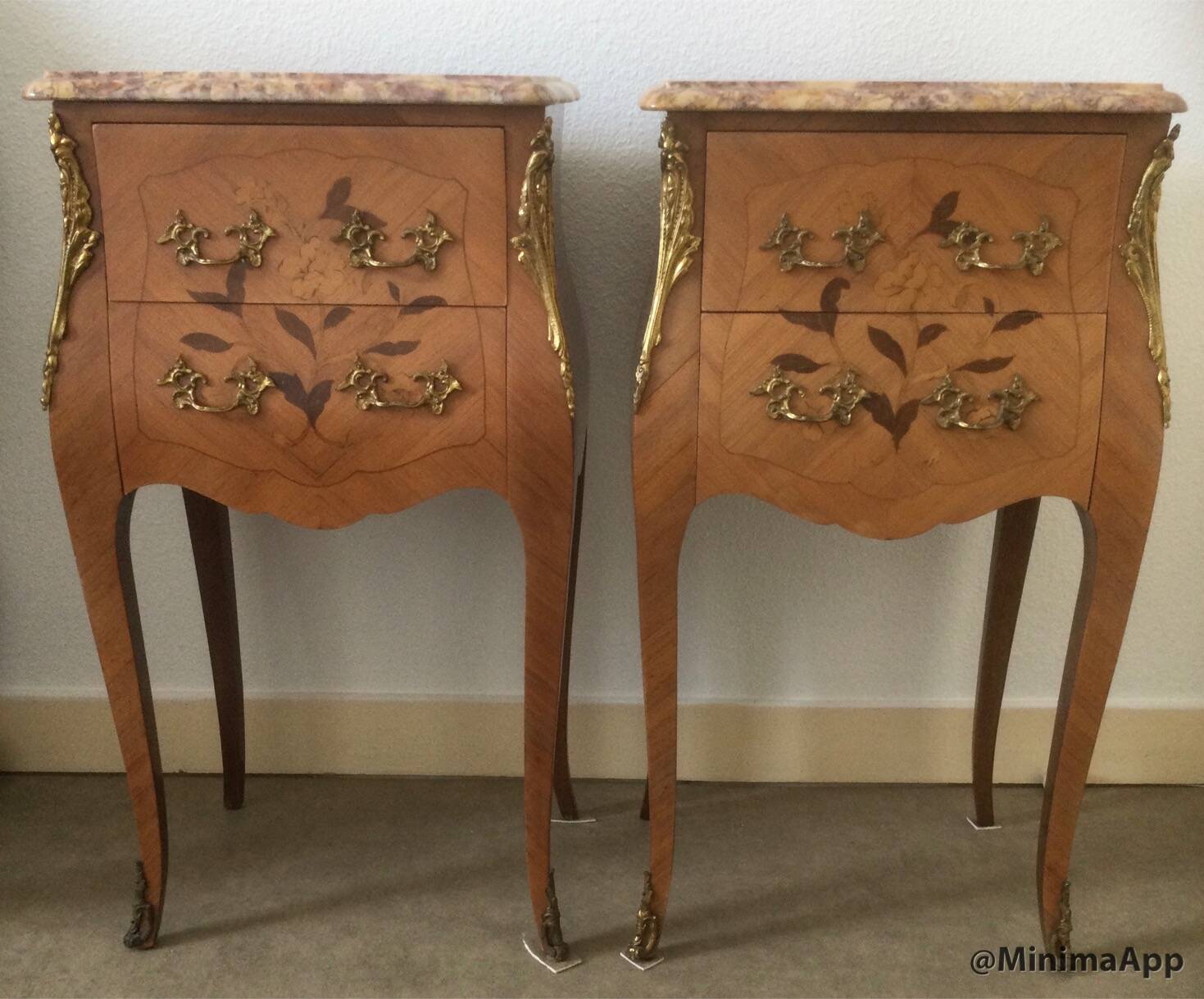Pair of curved bedside tables in the Louis XV style with noble wood marquetry from the period.