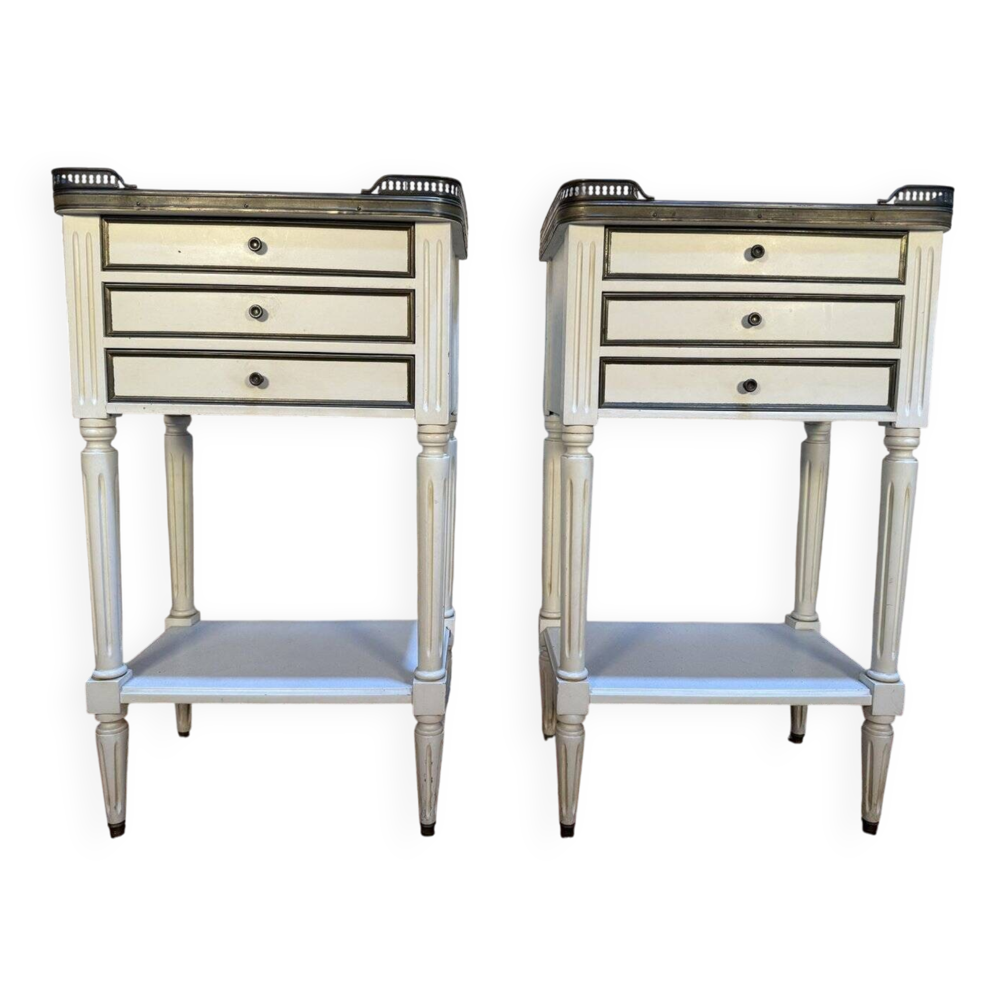 Pair of Louis XVI style bedside tables painted white.