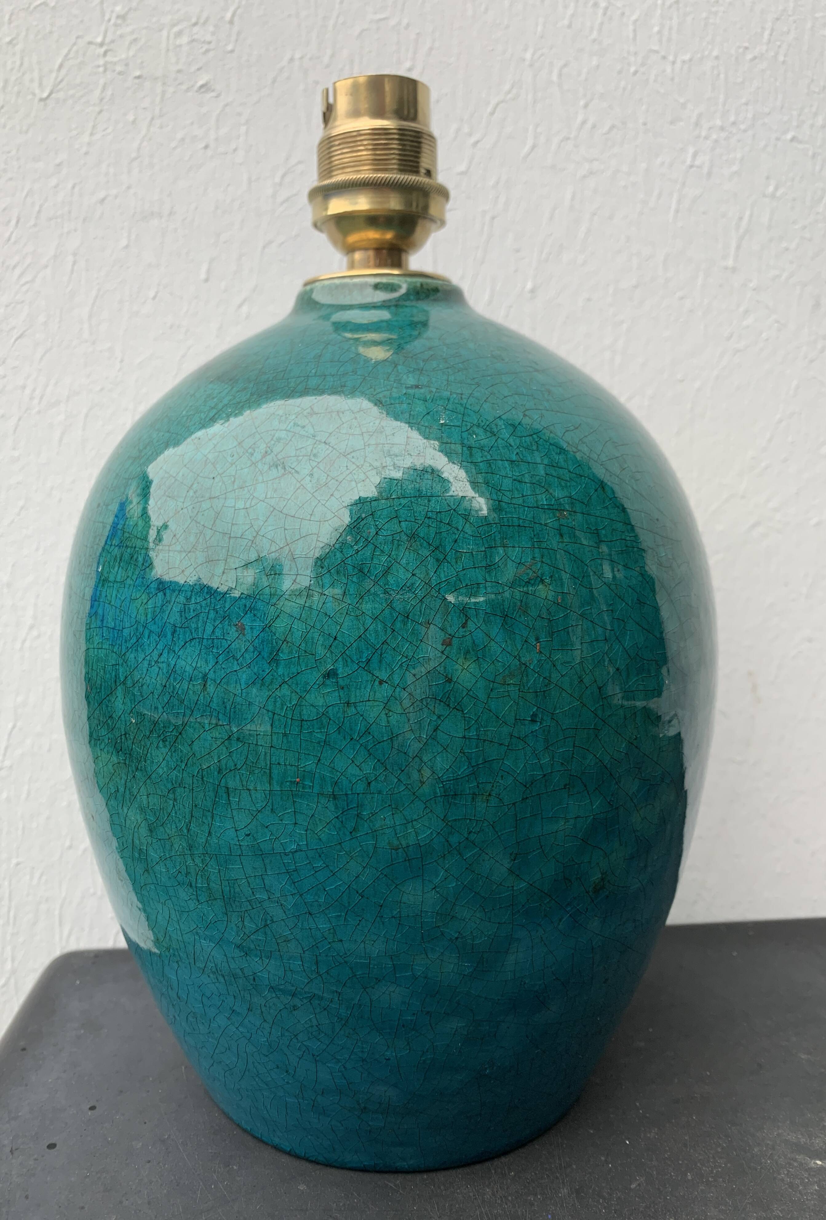 Ball lamp base in cracked ceramic and signed blue green