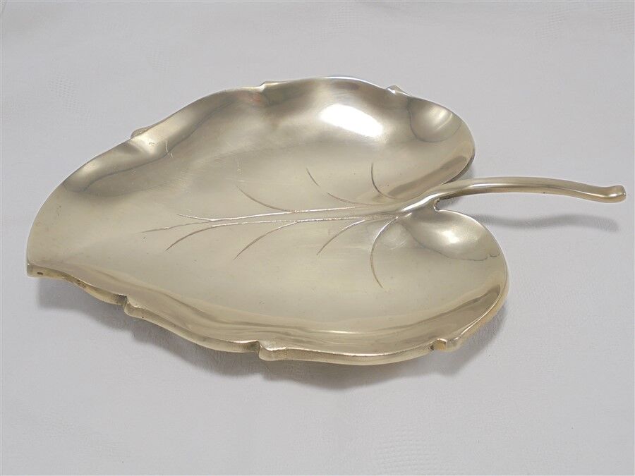 Brass pocket emptier