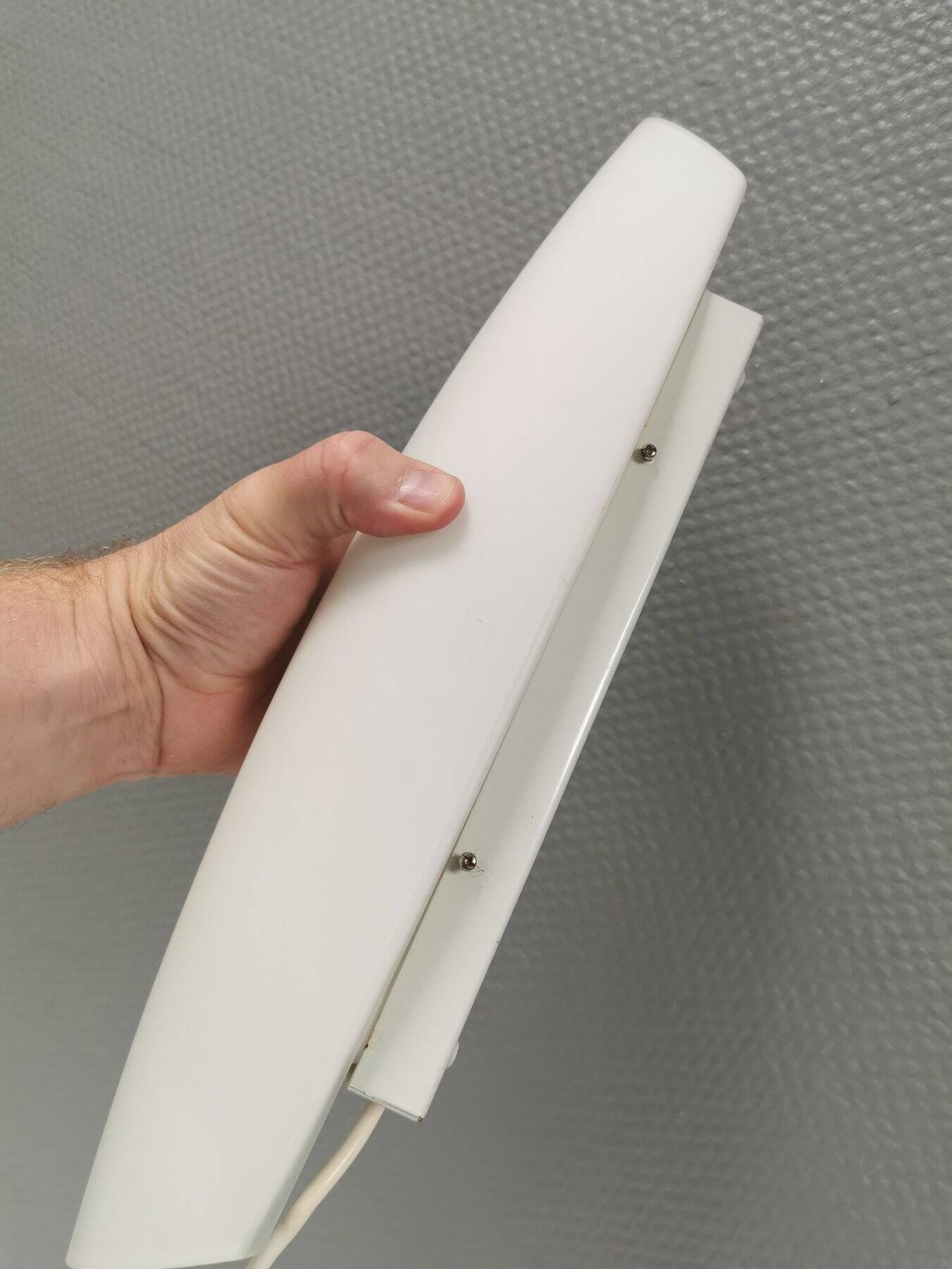 Wall lamp from Paulmann with white opal glass shade.