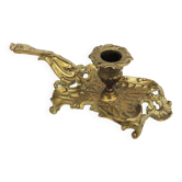 Antique rococo-style hand candlestick in bronze or brass