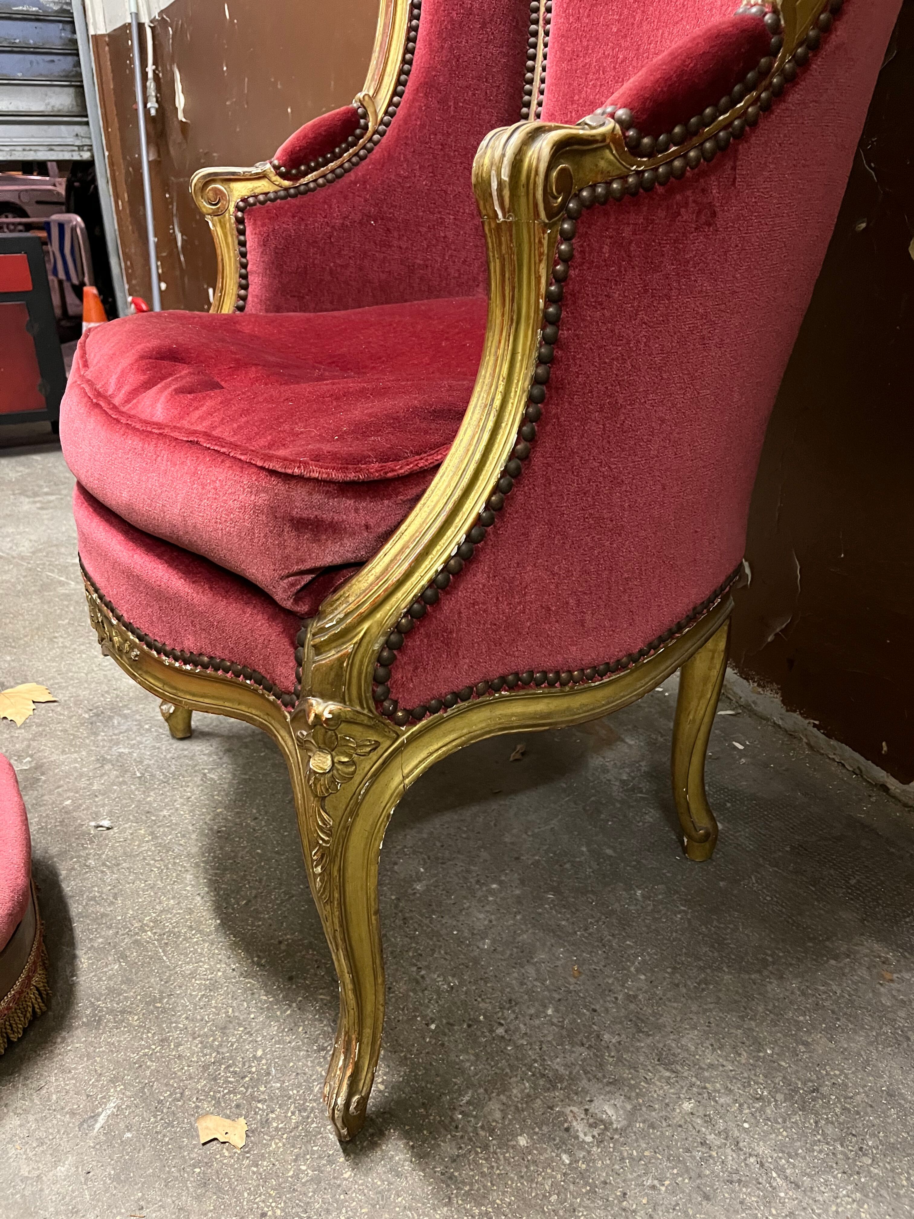 Gilded wooden armchair and footrest