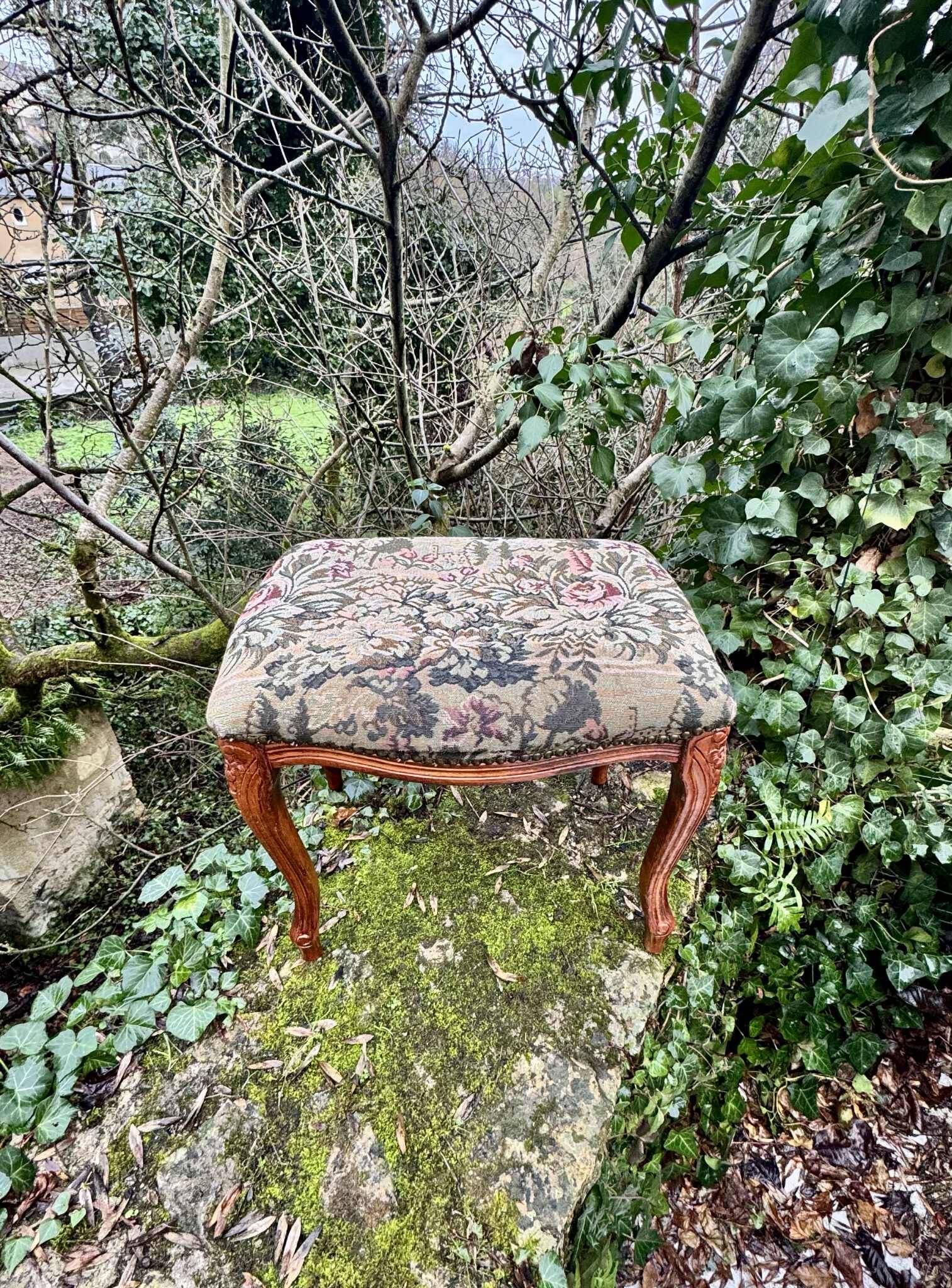 Large antique footrest in the Louis XV style.