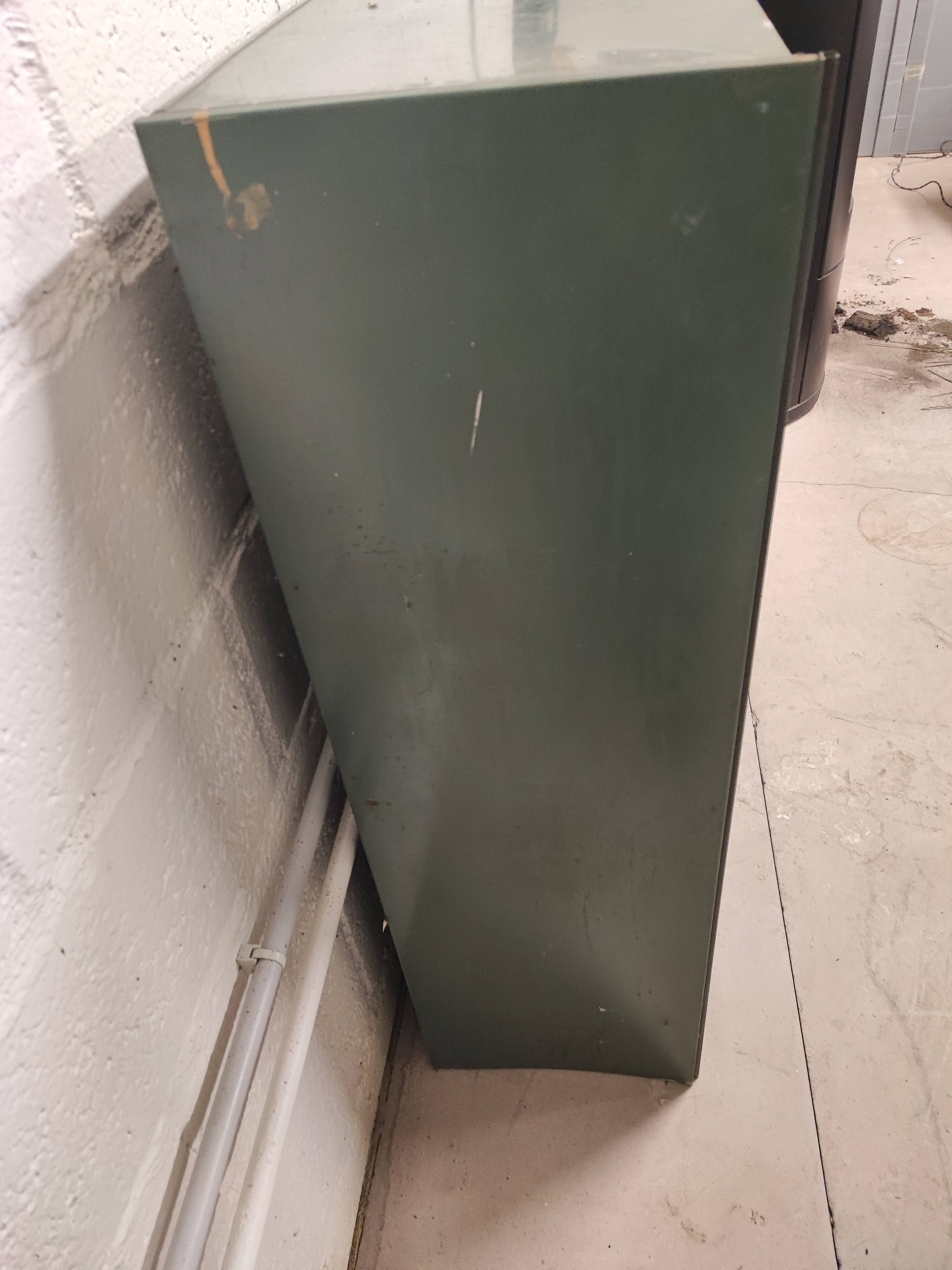 10-compartment metal locker with hinged door from the 50s