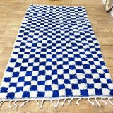 Moroccan Berber rug with a blue and ecru checkerboard pattern – 250 x 147 cm
