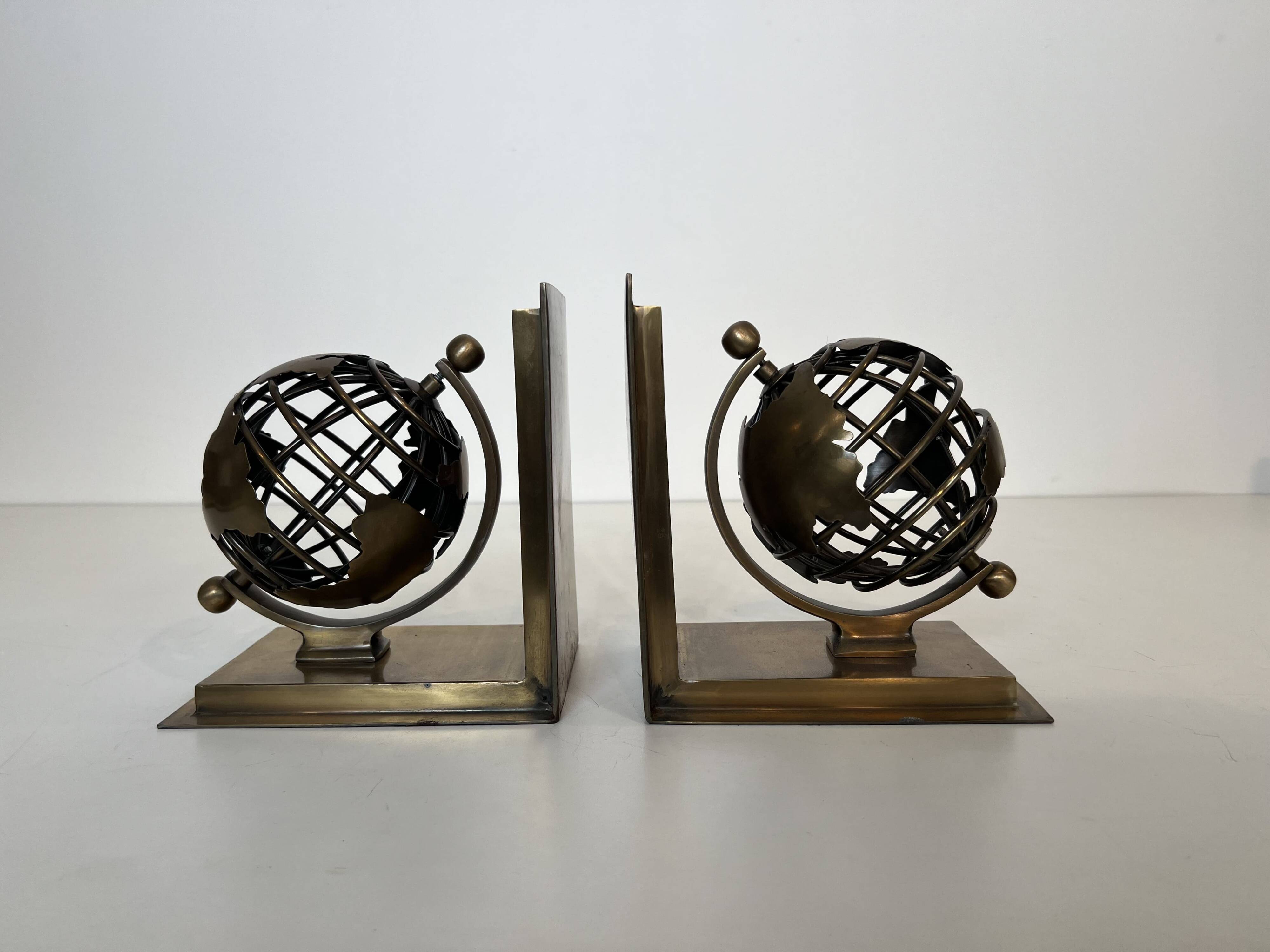 Pair of Brass Bookends with Openwork Globe Decorations. Work