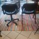 Two black leather armchairs