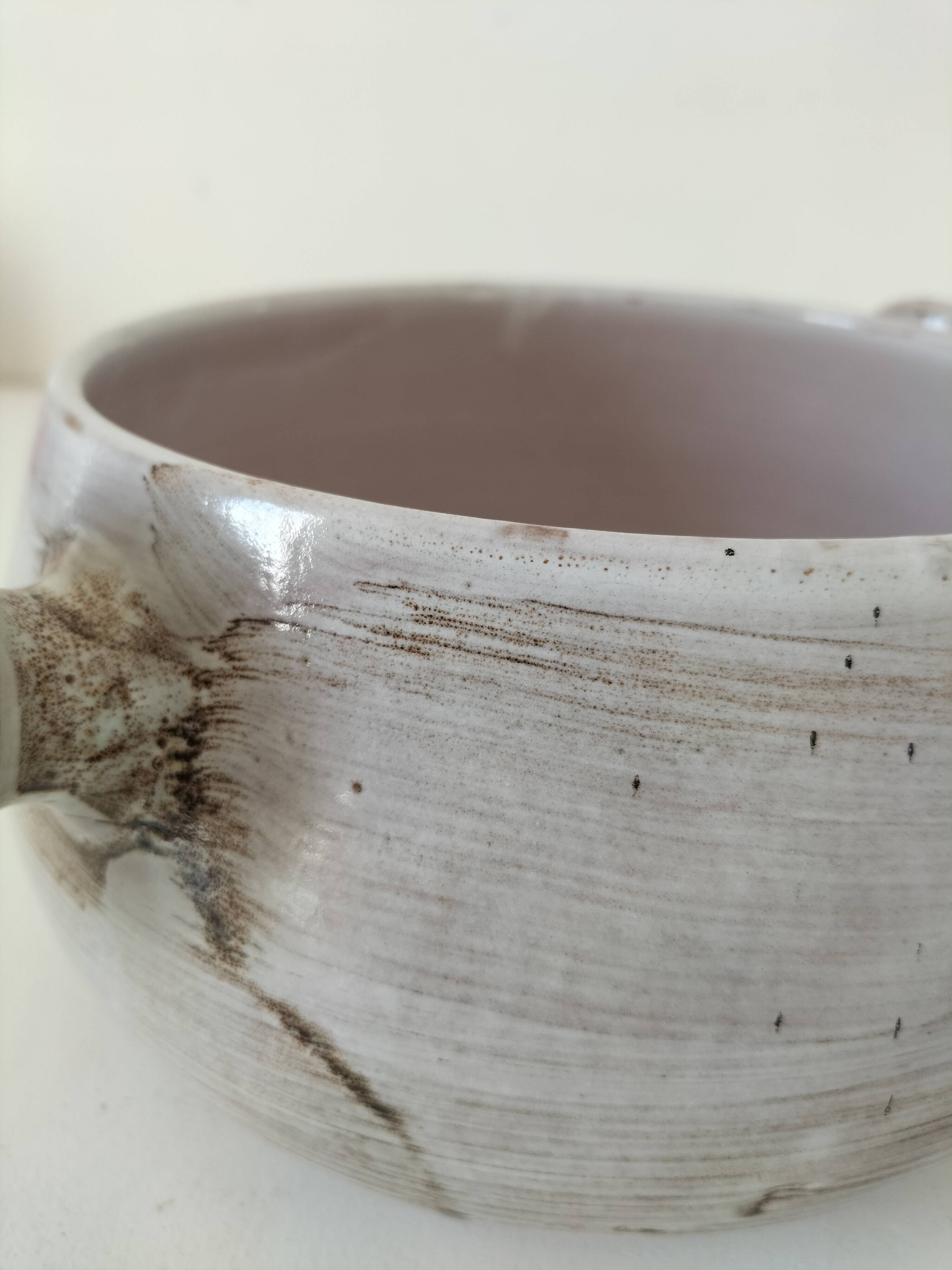 Glazed stoneware dish with floral motif