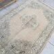 Small bige vintage floral rug