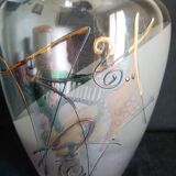 Glass vase with emmabled abstract patterns
