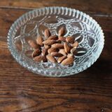 Cut glass goblet with a transparent stem.