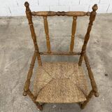 Straw and turned wood armchair