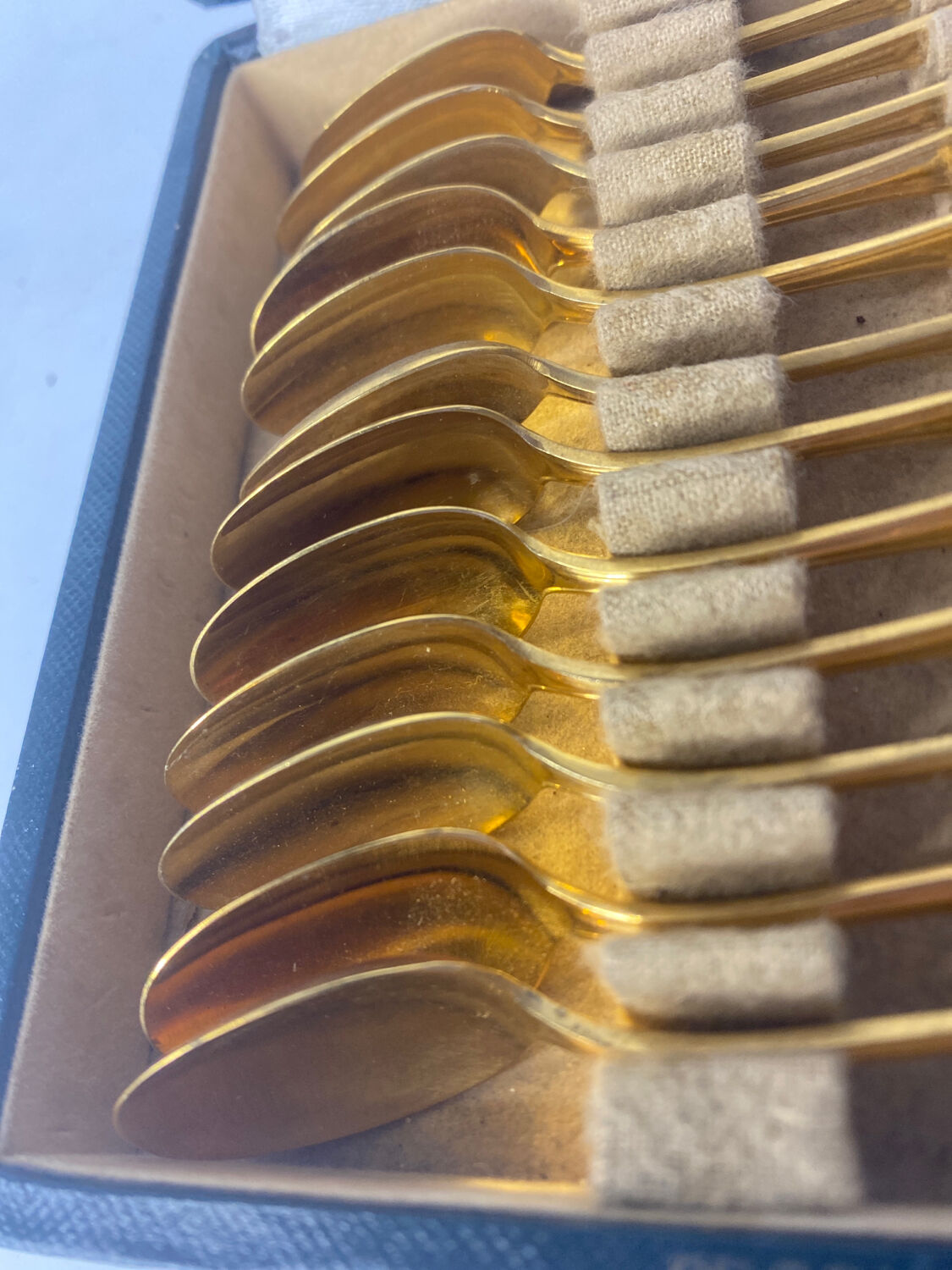 12 small silver-gilt spoons