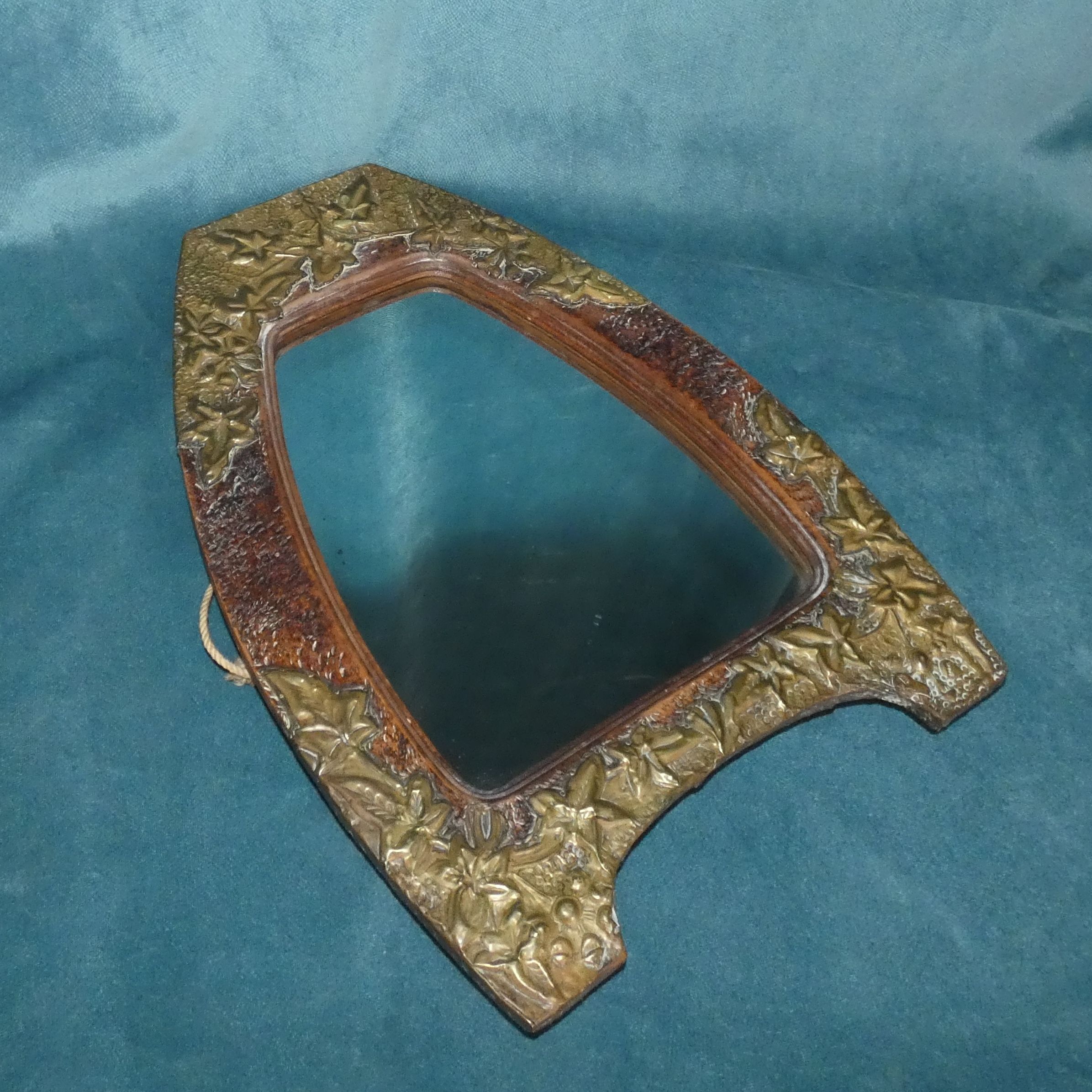 Mirror wood and appliques of brass repelled circa 1900 art nouveau france