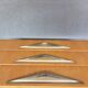 Vintage low enfilade from the 50s/60s – sculptural handles & tapered legs