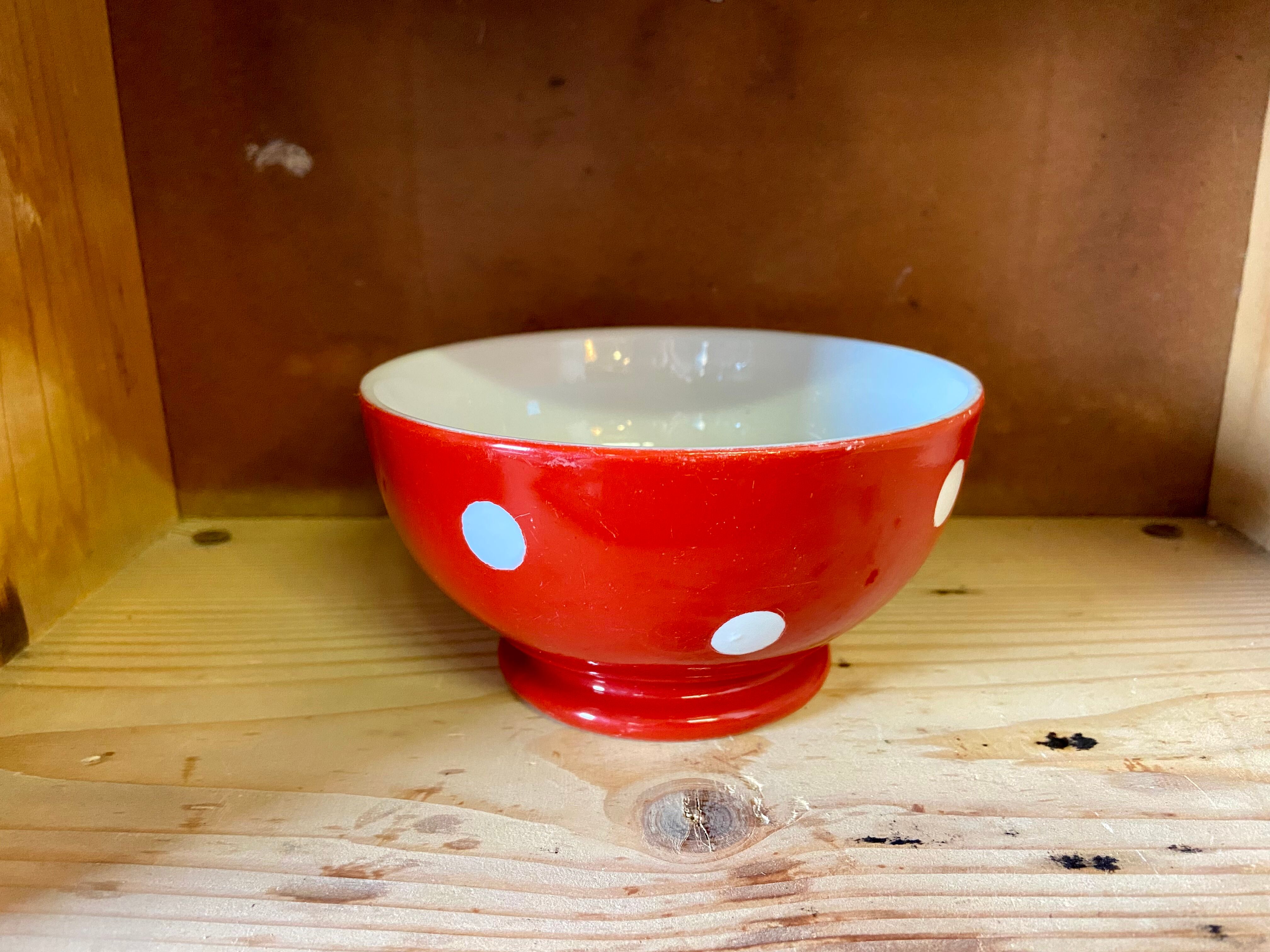 Old red and white bowl