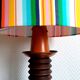 Wooden lamp with striped lampshade