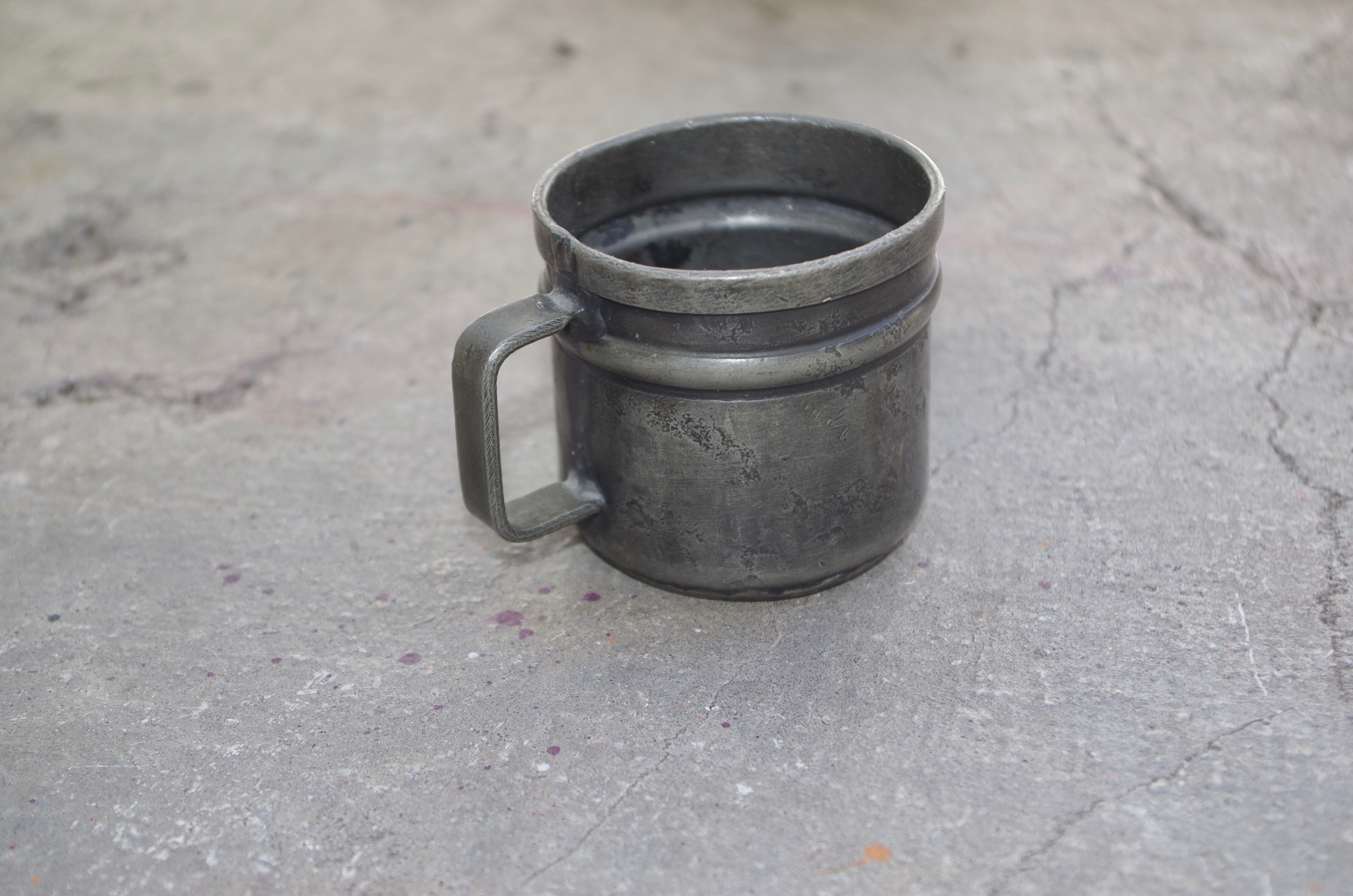 Old tin cup
