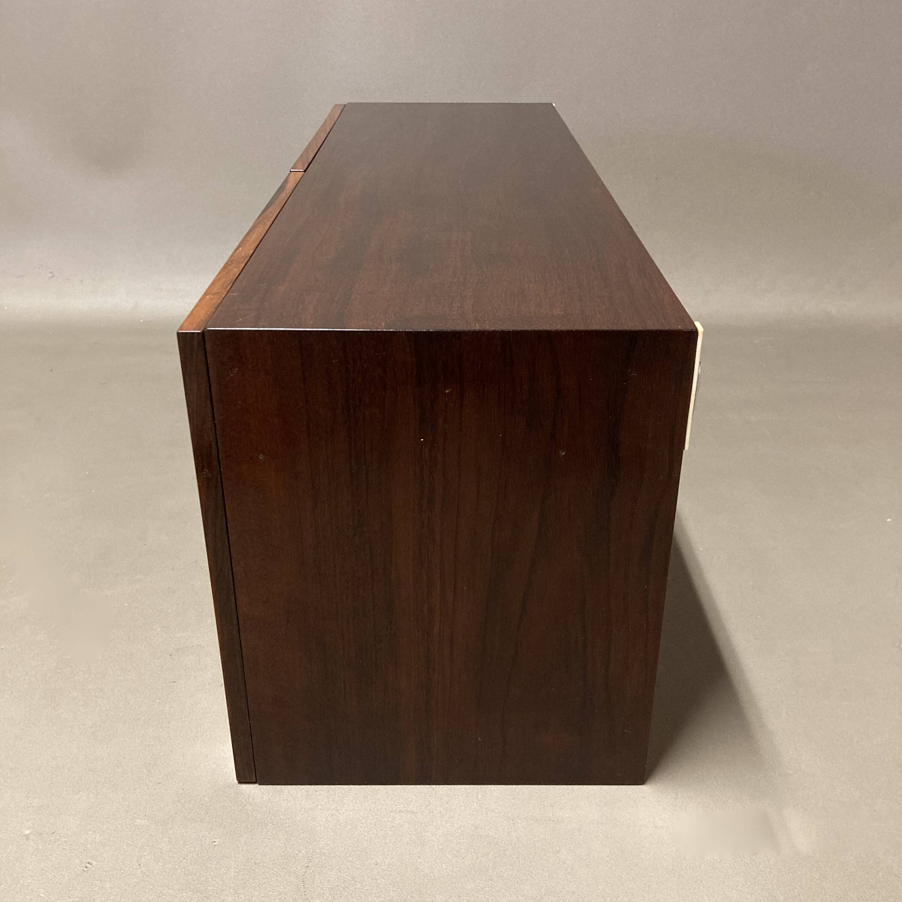 Scandinavian design rosewood hanging storage.