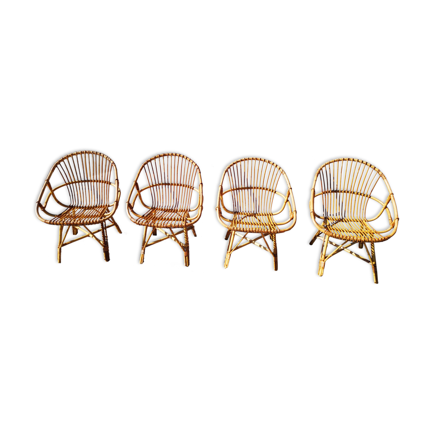 Four rattan chairs