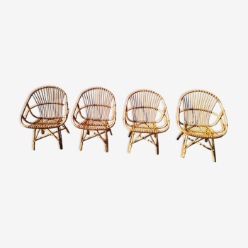 Four rattan chairs