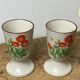 Pair of stoneware mazagrans, poppy decoration