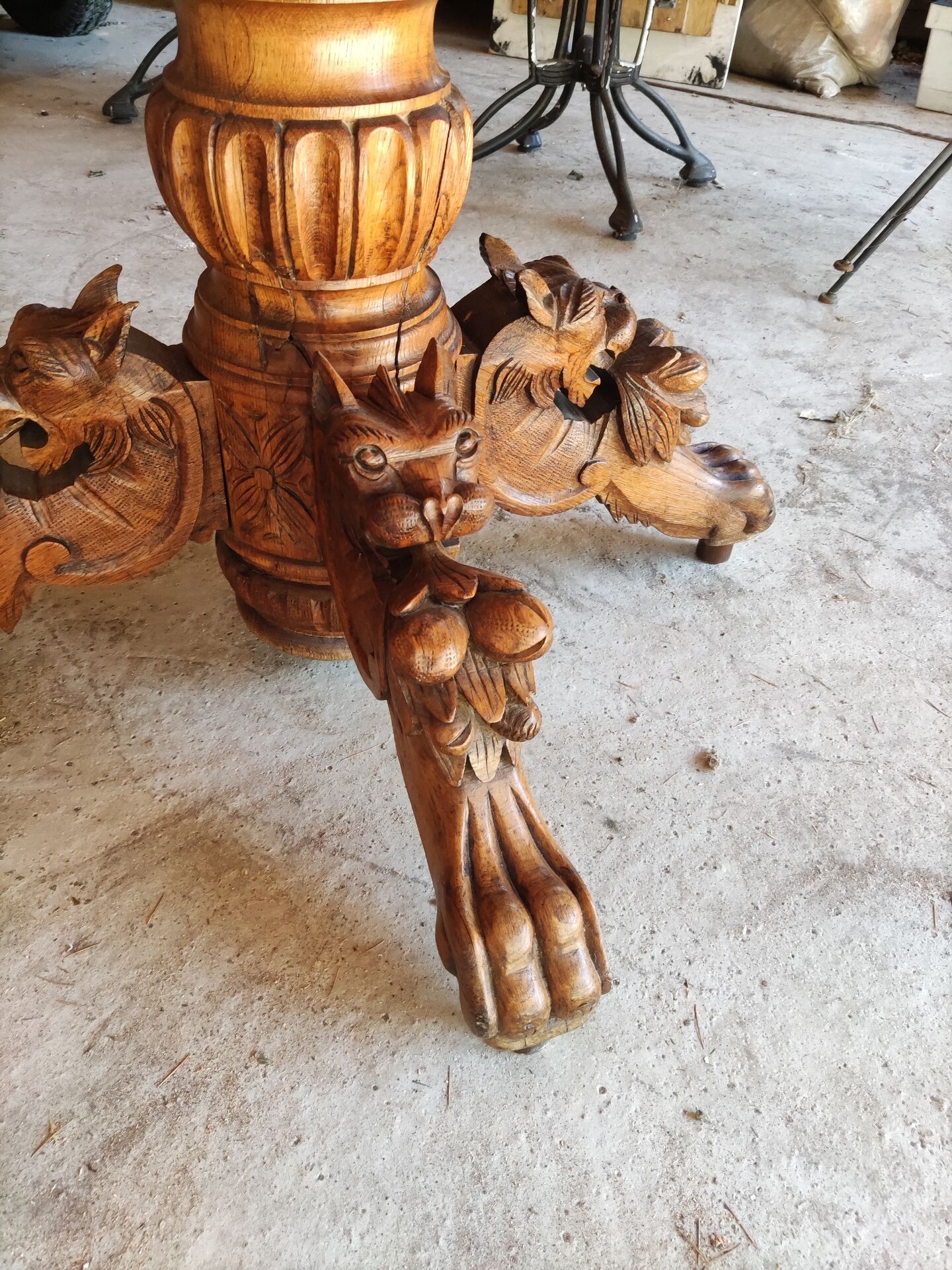 Oval oak table with carved details - known as a hunting table.