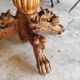 Oval oak table with carved details - known as a hunting table.