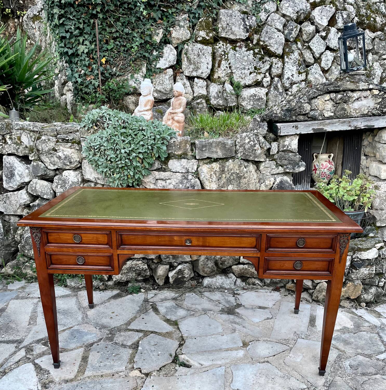 Elegant Louis XVI style mahogany flat desk from the 20th century