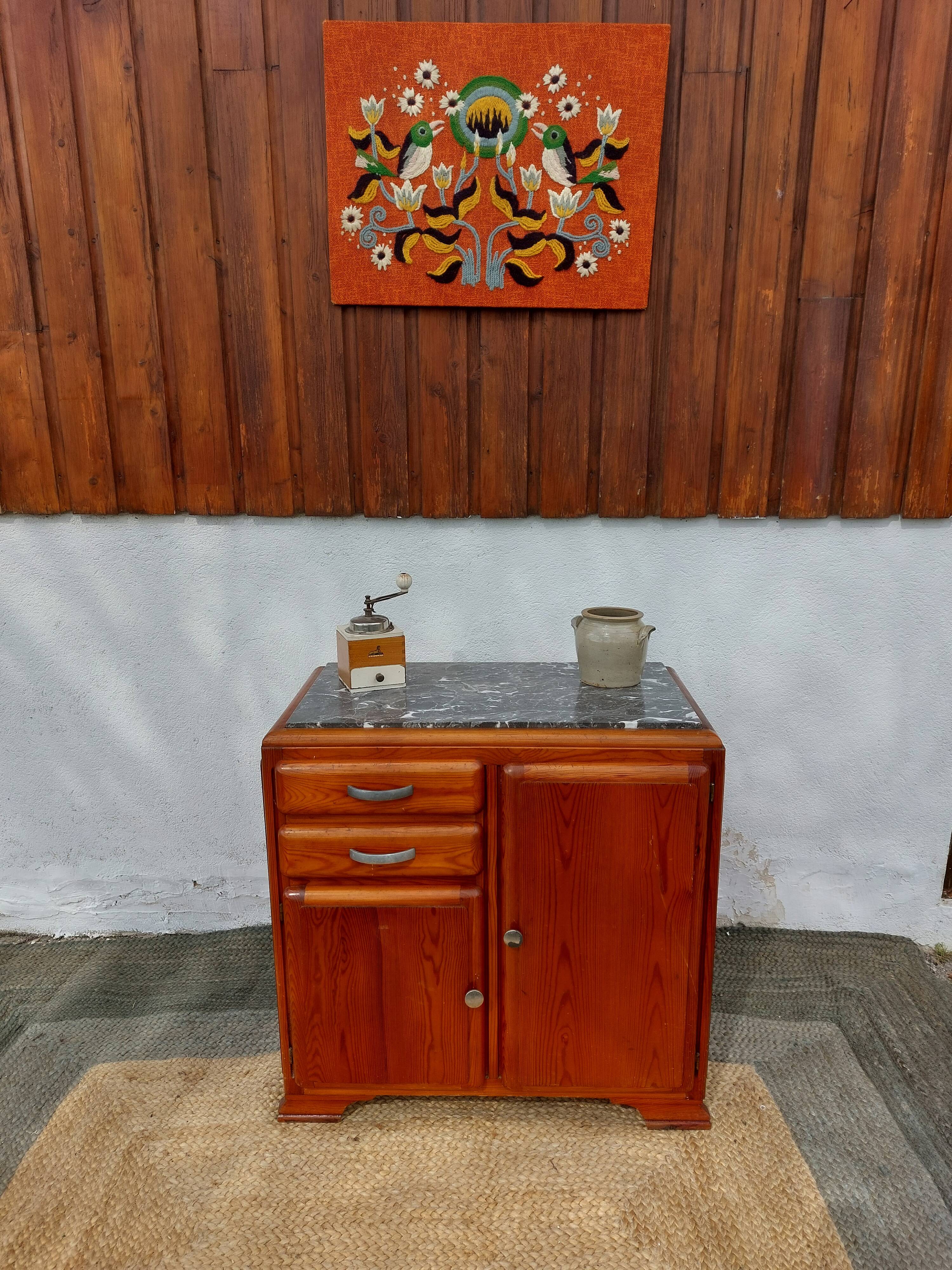 Mado buffet, marble top and asymmetrical doors.