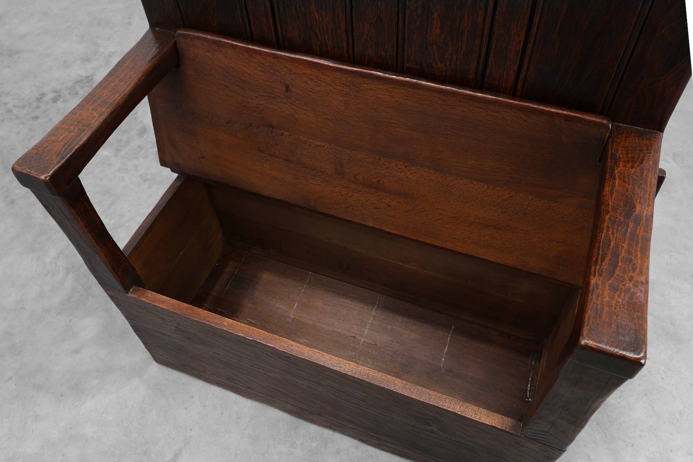 Rustic solid oak carved bench with storage compartment, France 19th century