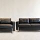 Set of (2) mid-century armchairs and a 2-seater sofa.