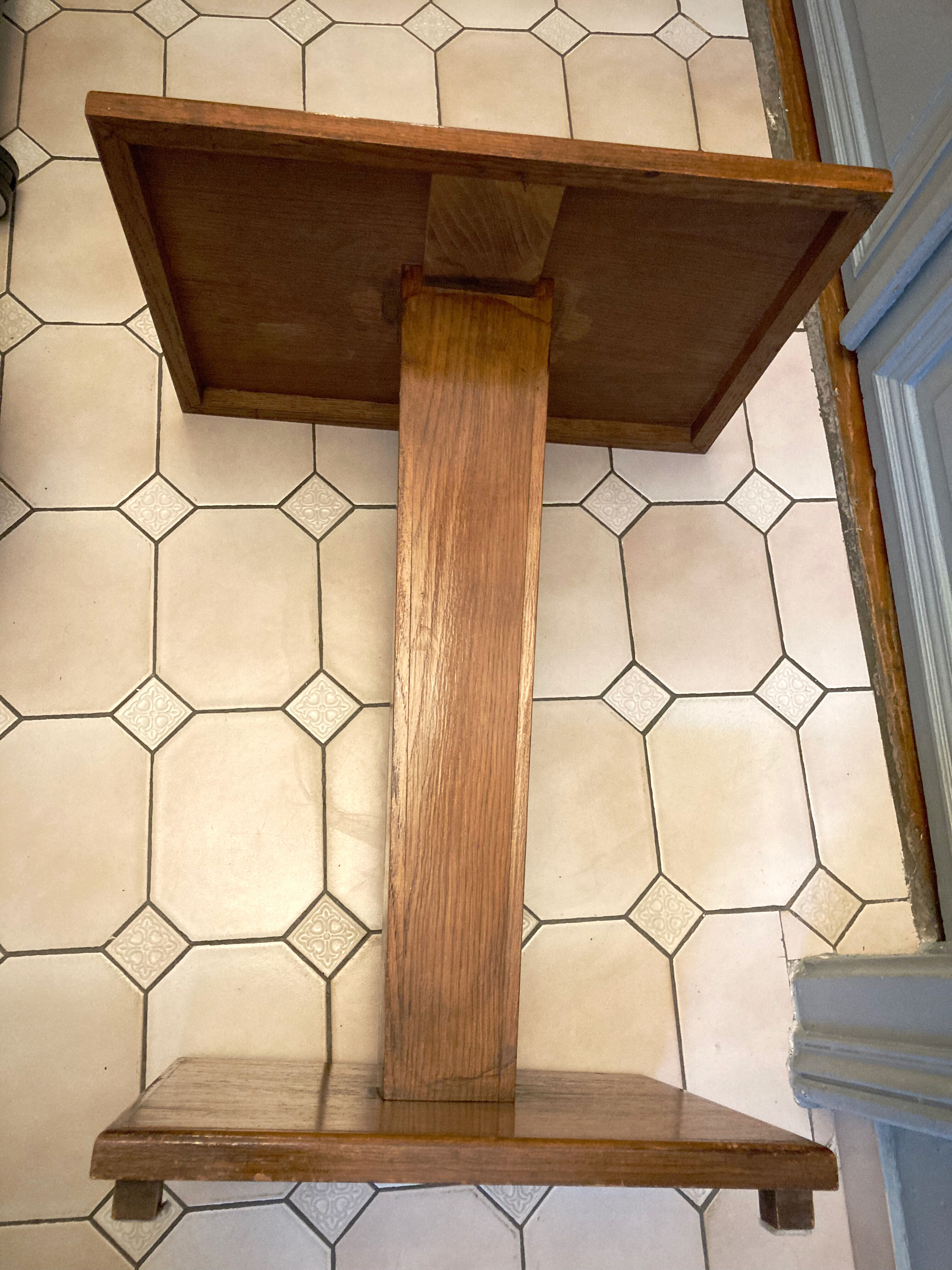 Square pedestal table with central foot 1930