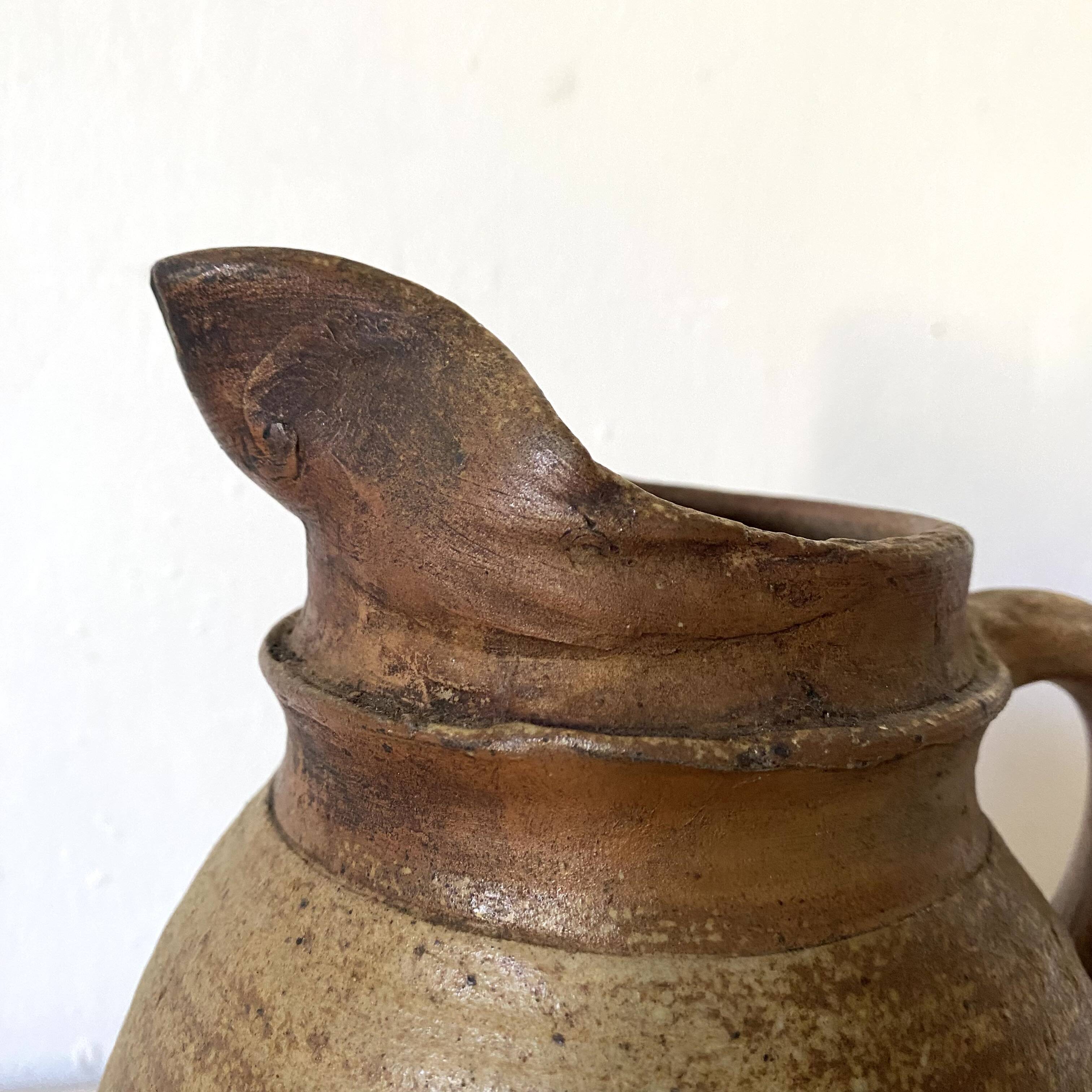 Antique terracotta pitcher
